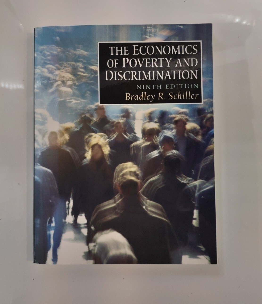 The Economics of Poverty and Discrimination by Schiller, Bradley R.