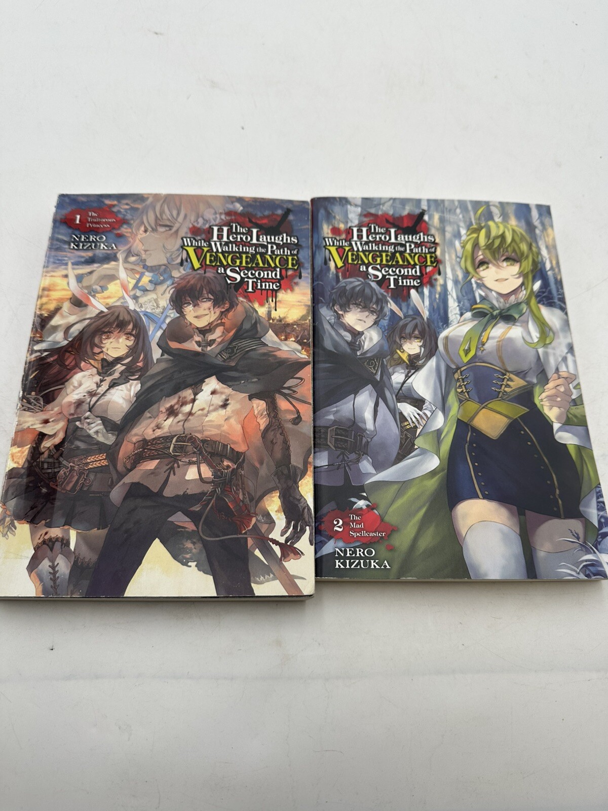 The Hero Laughs While Walking the Path of Vengeance a Second Time Vol. 1 + 2