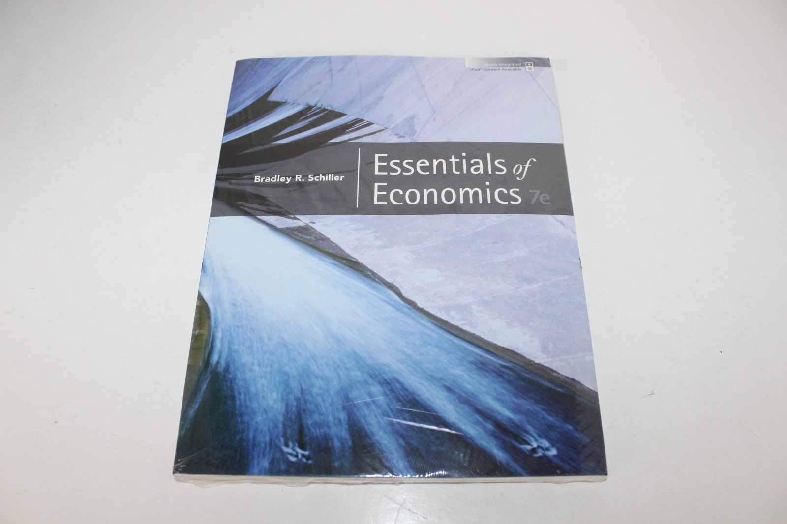 Essentials of Economics + Economy 2009 Update by Bradley R. Schiller NEW
