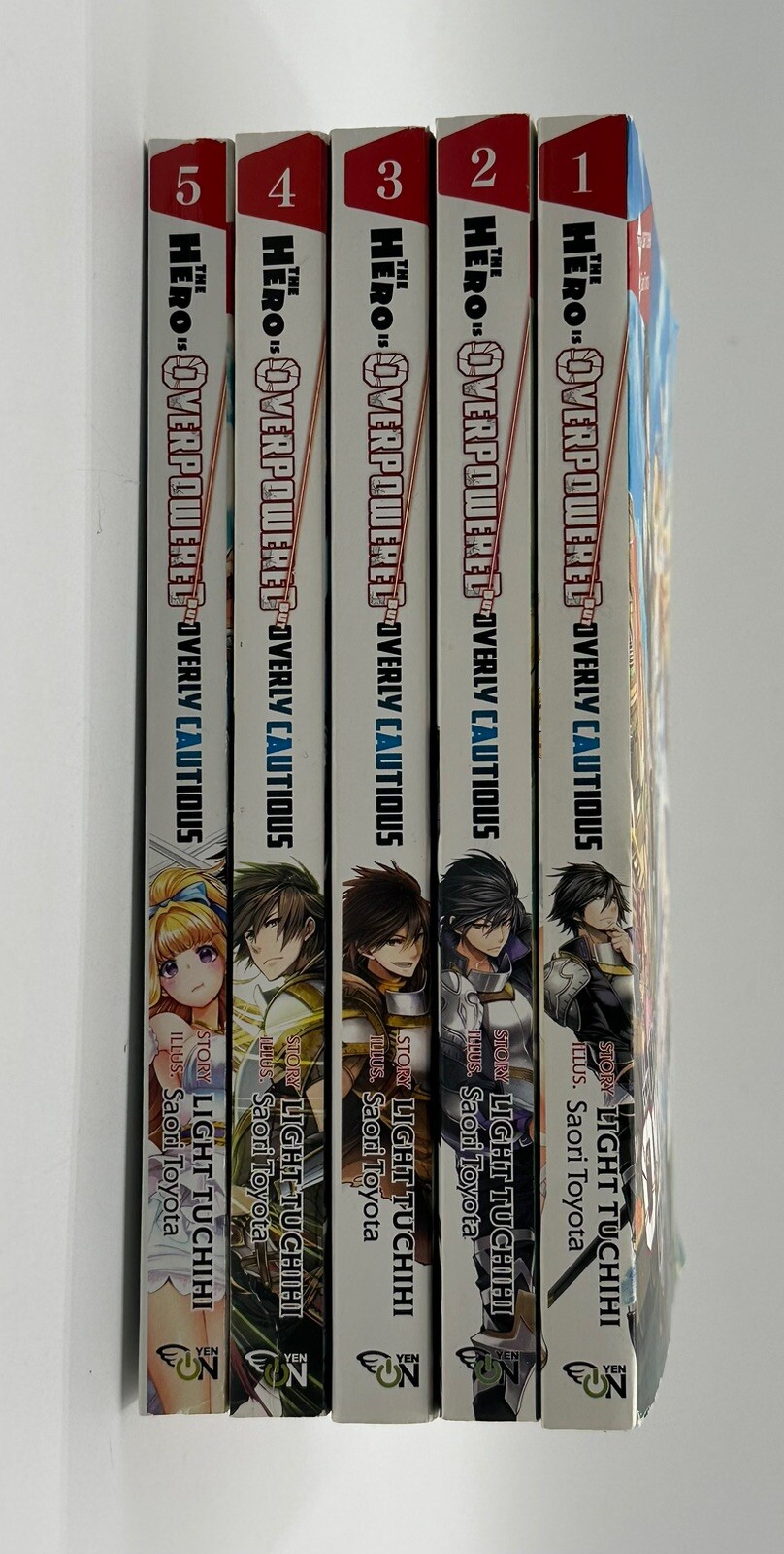 Lot The Hero Is Overpowered but Overly Cautious Vols. 1 Thru 5 English Paperback