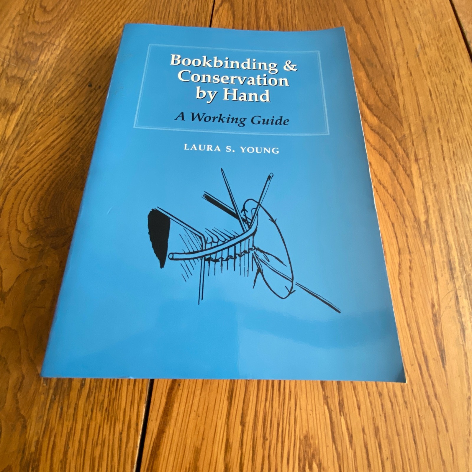 Bookbinding & Conservation by Hand: A Working Guide Laura Young Paperback